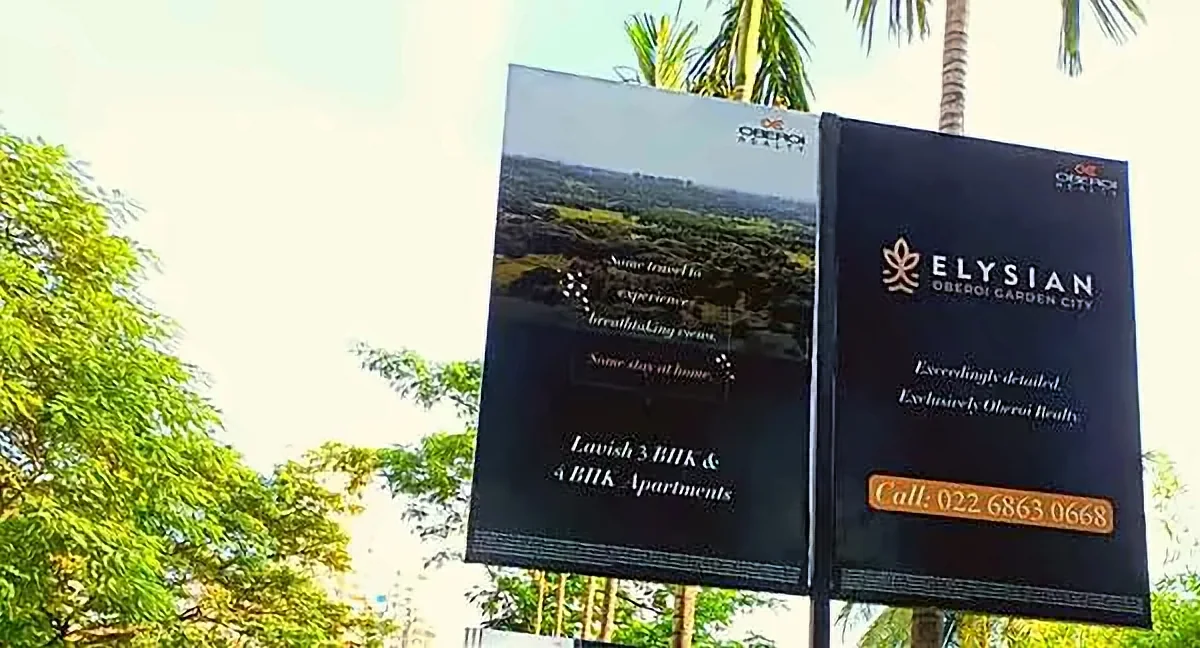 Realty site hoarding and flex branding by Crewnited